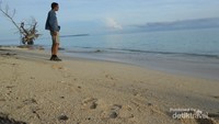 Pasir, pantai dan langit yang indah