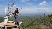 Spot foto seperti sedang berada d iruang tamu dengan tema outdoor