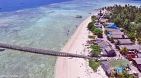 Pulau Salissingan memiliki jembatan yang cukup panjang untuk sandar kapal.
