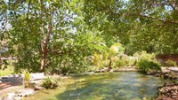 Sungai tempat mengalirnya air panas setelah dari kolam