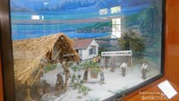 Diorama yang menggambar suasana transaksi dahulu