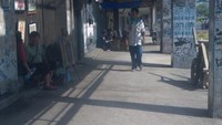 Pelukis Jalanan di Sepanjang Jalan Pintu Besar Selatan