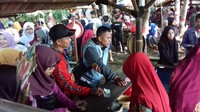 Foto: Penukaran uang di Pasar Doplang