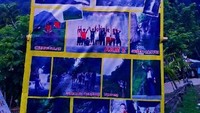 Banner yang terpampang di pintu masuk