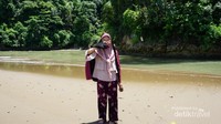 Potret sungai yang bermuara ke laut.