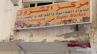 Papan nama Toko Indonesia, lengkap dengan bendera Merah Putih