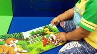 Aku suka membaca buku