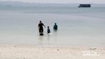 Wisata Hemat di Pantai Mutun, Lampung