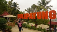 Tulisan Pule Payung menyambut pengunjung