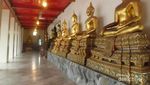 Kuil Buddha Tidur dan Koin Pengabul Permintaan