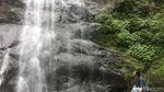 Potret Indahnya Air Terjun Tamasapi di Mamuju