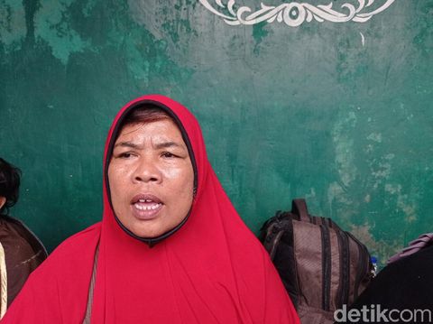 Pengungsi banjir Pejaten Timur, Sumarni.