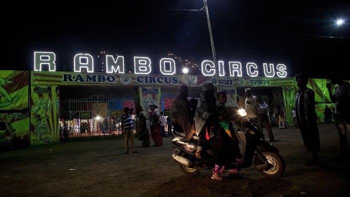 PIMPRI, INDIA - OCTOBER 18: Circus workers prepare their make-up before a show on October 18, 2015 at the Rambo Circus in Pimpri, India. The Rambo Circus travels throughout India and hosts visiting circus artists from Ethiopia, Nepal and Russia, among other countries. A crackdown on the use of wild animals in the circus has led to a decline in the industry, but Rambo circus owner, Sujit Dilip, continues to attract customers with new acts and air conditioned tents. (Photo by Allison Joyce/Getty Images)