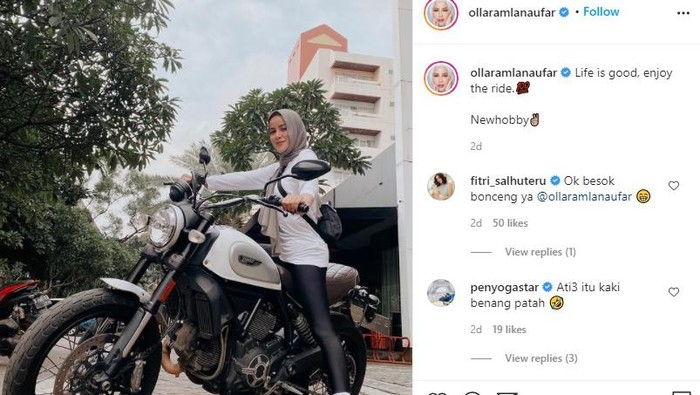 Olla Ramlan naik motor