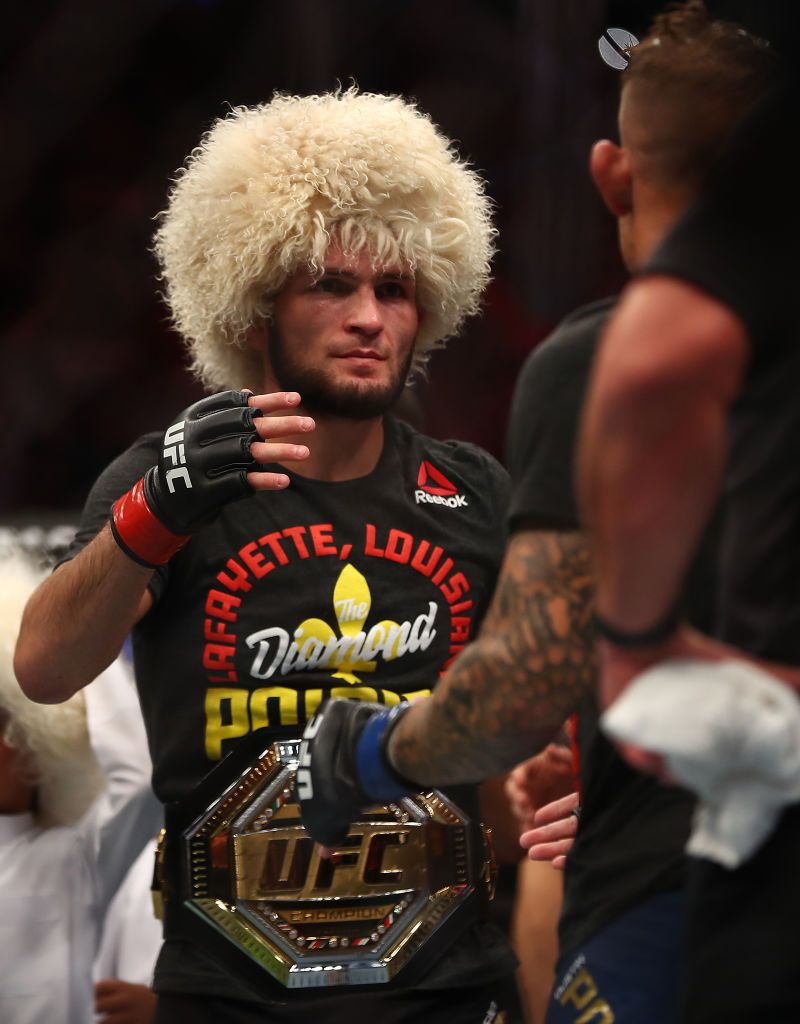 ABU DHABI, UNITED ARAB EMIRATES - SEPTEMBER 07: Khabib Nurmagomedov of Russia celebrates his submission victory over Dustin Poirier Dustin of United States in their Lightweight Title Bout during the UFC 242 event at The Arena on September 07, 2019 in Abu Dhabi, United Arab Emirates. (Photo by Francois Nel/Getty Images)