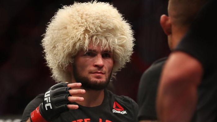 ABU DHABI, UNITED ARAB EMIRATES - SEPTEMBER 07: Khabib Nurmagomedov of Russia celebrates his submission victory over Dustin Poirier Dustin of United States in their Lightweight Title Bout during the UFC 242 event at The Arena on September 07, 2019 in Abu Dhabi, United Arab Emirates. (Photo by Francois Nel/Getty Images)