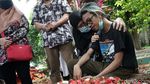 Foto-foto Pemakaman Yuri OM PMR