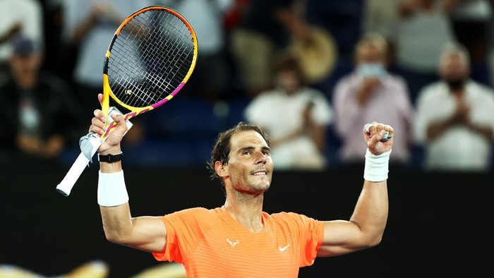 MELBOURNE, AUSTRALIA - FEBRUARY 11: Rafael Nadal of Spain celebrates winning his Mens Singles second round match against Michael Mmoh of the United States during day four of the 2021 Australian Open at Melbourne Park on February 11, 2021 in Melbourne, Australia. (Photo by Cameron Spencer/Getty Images)