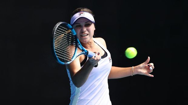 MELBOURNE, AUSTRALIA - FEBRUARY 11: Sofia Kenin of the United States of America plays a forehand in her Women's Singles second round match against Kaia Kanepi of Estonia during day four of the 2021 Australian Open at Melbourne Park on February 11, 2021 in Melbourne, Australia. (Photo by Darrian Traynor/Getty Images)
