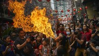 Tahun Baru Imlek dirayakan setiap tahun oleh orang Tionghoa Filipina yang berjumlah 25 persen dari populasi lokal. Jes Aznar/Getty Images  