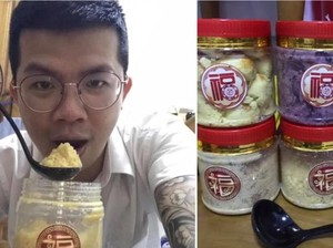Gegara Kue Imlek Miliknya Hancur, Pria Ini Makan Kue Kering Pakai Sendok!