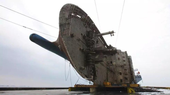 The wreck of the Sewol ferry is carried away by a ship off South Korea in 2017 HANDOUT SOUTH KOREAN MARITIME MINISTRY/AFP