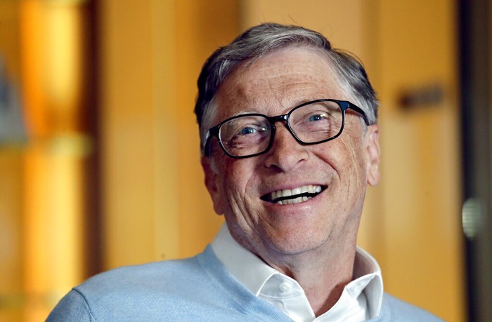 FILE - In this Feb. 1, 2019, file photo, Bill Gates smiles while being interviewed in Kirkland, Wash. Washington states richest residents, including Gates and Jeff Bezos, would pay a wealth tax on certain financial assets worth more than $1 billion under a proposed bill whose sponsor says she is seeking a fair and equitable tax code. Under the bill, starting Jan. 1, 2022, for taxes due in 2023, a 1% tax would be levied not on income, but on 