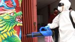 COVID-19 Masih Berbahaya, Klenteng di Bandung Disemprot Disinfektan