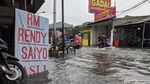 Jalan Rawa Buaya Tergenang Setinggi 40 Cm