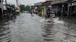 Jalan Rawa Buaya Tergenang Setinggi 40 Cm