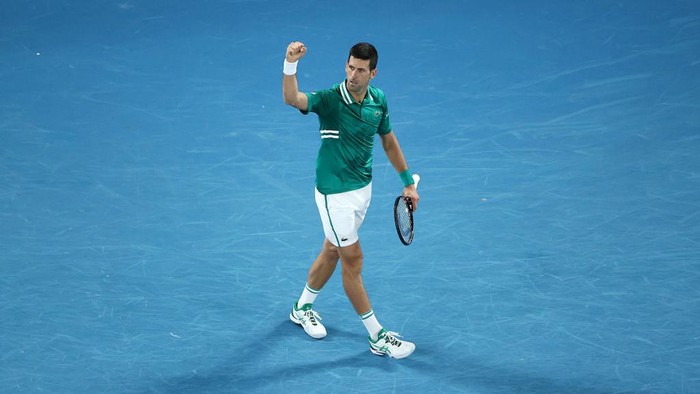MELBOURNE, AUSTRALIA - FEBRUARY 16: Novak Djokovic of Serbia celebrates after winning a point  in his Mens Singles Quarterfinals match against Alexander Zverev of Germany during day nine of the 2021 Australian Open at Melbourne Park on February 16, 2021 in Melbourne, Australia. (Photo by Cameron Spencer/Getty Images)
