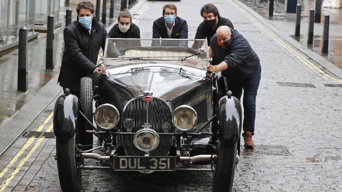 Bugatti Type 57S 1937 A 1937 Bugatti Type 57S, one of the world's most valuable and desirable pre-war motor cars, is polished by staff at the Bonhams auction house in London, Tuesday, Feb. 16, 2021. Bonhams Legend of the Road Sale is featuring a 1937 Bugatti Type 57S, with an estimate £5,000,000 - 7,000,000. The Bugatti has been hidden for the past 50 years and is one of 42 examples of the 57S variants that were produced. (AP Photo/Frank Augstein)