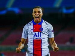 Mbappe merayakan gol keduanya yang dicetak di menit ke-65. Gol diawali sapuan buruk Gerard Pique atas crossing Florenzi. AP Photo/Joan Monfort