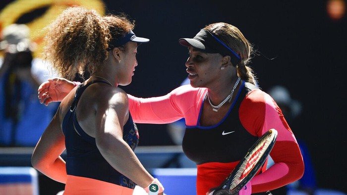 Japans Naomi Osaka, left, is congratulated by United States Serena Williams after winning their semifinal match at the Australian Open tennis championship in Melbourne, Australia, Thursday, Feb. 18, 2021.(AP Photo/Andy Brownbill)