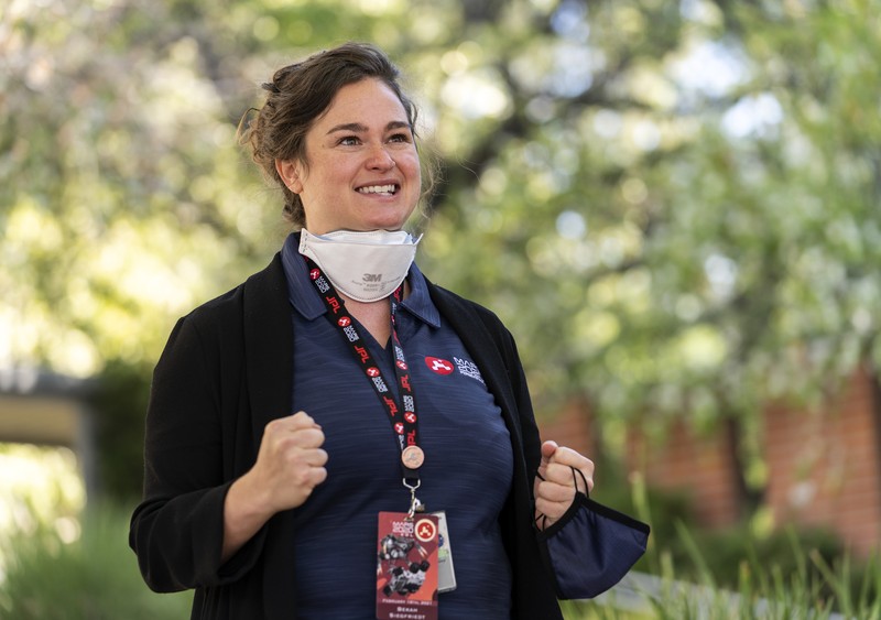 Thomas Zurbuchen, NASA Associate Administrator Science Mission Directorate, raises his arms, center, with Lori Glaze, Director of NASA's Science Mission Directorate's Planetary Science Division, right, as they walk with members of NASA's Perseverance rover team after receiving confirmation the spacecraft successfully touched down on Mars, Thursday, Feb. 18, 2021, at NASA's Jet Propulsion Laboratory in Pasadena, Calif. (AP Photo/Damian Dovarganes)