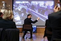 French President Emmanuel Macron attends a viewing meeting of the landing of the NASA Perseverance Mars rover on the planet Mars at the French National Center for Space Studies (CNES) in Paris, Thursday, Feb. 18 2021. A NASA rover streaked through the orange Martian sky and landed on the planet Thursday, accomplishing the riskiest step yet in an epic quest to bring back rocks that could answer whether life ever existed on Mars. The Perseverance rover carries the SuperCam instrument, built by a US-French team of several dozen engineers and scientists from CNES, CNRS and universities. (Christophe Petit Tesson, Pool via AP)
