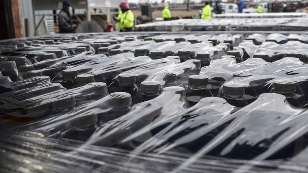 Bottled water placed on pallets at the City of Houston Upper Braes Warehouse to be delivered to vulnerable populations in the City of Houston during a boil water notice, Thursday, Feb. 18, 2021, in Houston. Houston is currently under a boil water notice because of issues with the water treatment process due to the cold weather. (Marie D. De Jesús/Houston Chronicle via AP)