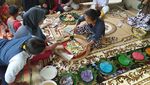 Foto: Tradisi Tedak Siten yang Sarat Makna