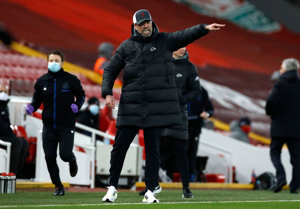 Liverpool vs Everton LIVERPOOL, ENGLAND - FEBRUARY 20: Georginio Wijnaldum of Liverpool and Mohamed Salah of Liverpool look dejected after conceding a second goal during the Premier League match between Liverpool and Everton at Anfield on February 20, 2021 in Liverpool, England. Sporting stadiums around the UK remain under strict restrictions due to the Coronavirus Pandemic as Government social distancing laws prohibit fans inside venues resulting in games being played behind closed doors. (Photo by Laurence Griffiths/Getty Images)