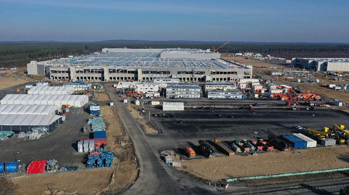 GRUENHEIDE, GERMANY - FEBRUARY 21: In this aerial view from a drone, the construction site of the Tesla Gigafactory Berlin-Brandenburg stands on February 21, 2021 near Gruenheide, Germany. The factory, Teslas fourth worldwide, is scheduled to begin producing the Tesla Y electric car in July, 2021, with production of the Tesla 3 to begin thereafter.  (Photo by Sean Gallup/Getty Images)