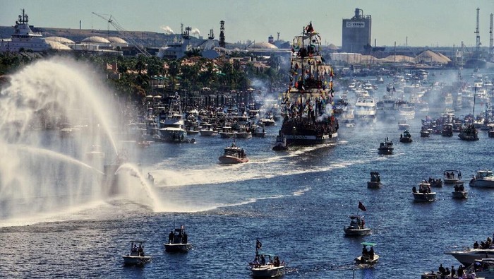 The Jose Gasparilla pirate ship, carrying members of Ye Mystic Krewe of Gasparilla, arrives at the Tampa Convention Center during the 103nd Gasparilla Invasion and Parade of the Pirates on Saturday, Jan. 25, 2020, in Tampa. This year's event was postponed and then canceled due to the coronavirus pandemic. The group now says the next one won't be held until January 2022. (Douglas R. Clifford/Tampa Bay Times via AP)