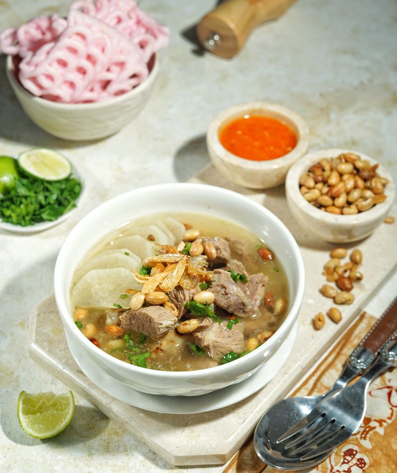 The famous Indonesian Soto from West Java namely is Soto Bandung, is clear beef soto that has pieces of white radish and sprinkled with fried soybeans.