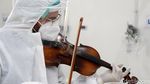Alunan Biola Jadi Cara Dokter di Tunisia Hibur Pasien COVID-19
