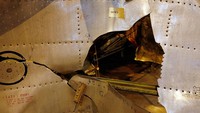 Ledakan itu disebabkan sebuah bom yang disembunyikan dalam pemutar audio kaset, dan diledakkan di bagian kargo ketika pesawat berada di ketinggian 9,4 kilometer. Getty Images/Peter Macdiarmid  