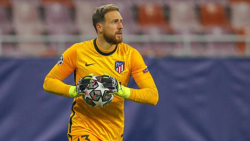 Atletico Madrid's goalkeeper Jan Oblak holds the ball during the Champions League, round of 16, first leg soccer match between Atletico Madrid and Chelsea at the National Arena stadium in Bucharest, Romania, Tuesday, Feb. 23, 2021. (AP Photo/Vadim Ghirda)