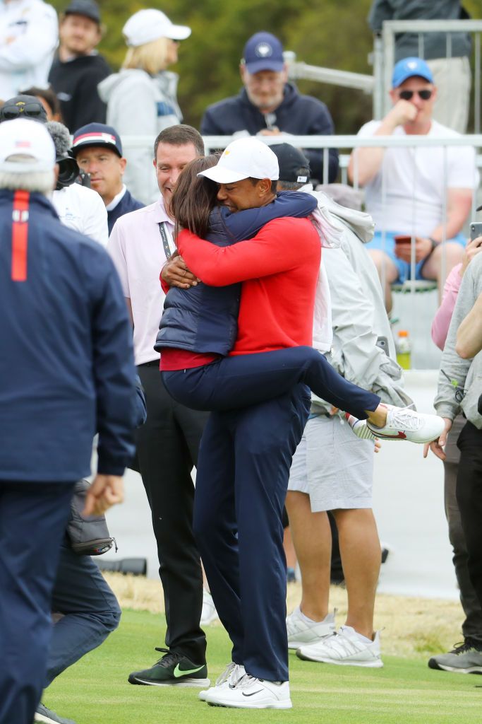 MELBOURNE, AUSTRALIA - DECEMBER 06:  Tiger Woods and his girlfriend Erica Herman look on during a Presidents Cup media opportunity at the Yarra Promenade on December 5, 2018 in Melbourne, Australia. The Presidents Cup 2019 will be held on December 9-15, 2019, when it returns to the prestigious Royal Melbourne Golf Club in Australia.  (Photo by Scott Barbour/Getty Images)