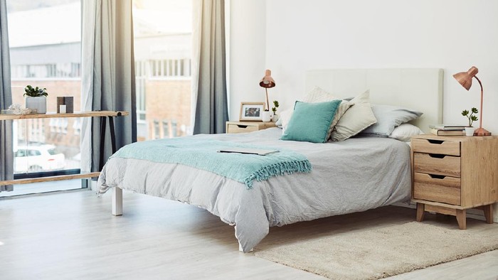 Cropped shot of an empty and neatly arranged bedroom at home during the day