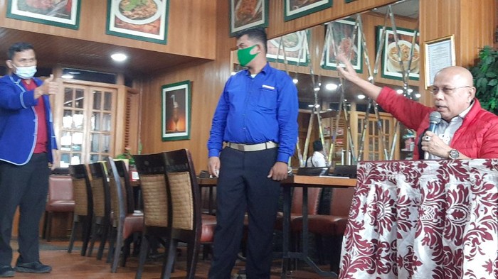 Satgas Rajawali PD datangai konferensi pers Kader Muda Demokrat.