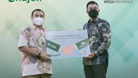Nujek merupakan singkatan dari Nusantara Ojek. Penumpang bisa memilih driver secara langsung dan bisa berlangganan. Foto: Mega Insurance