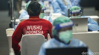 Masing-masing atlet nampak mengenakan seragam sesuai dengan cabang olahraganya.